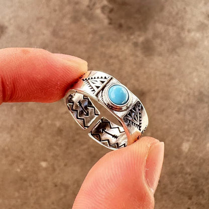 Men's ring with adjustable wide face opening
